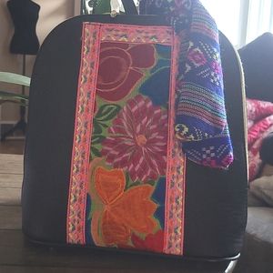 Embroidered leather backpack